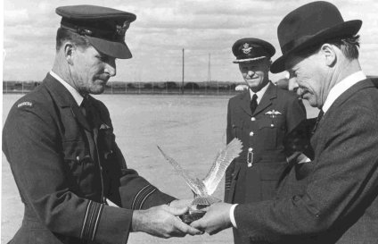 Sqn Ldr Norman Walsh receives the Jacklin Trophy